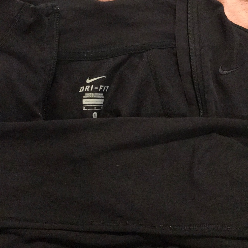nike jacket with zipper pockets